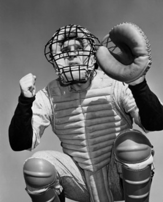 Low Angle View of a Baseball Catcher Crouching Poster Print - 18 x 24 in.