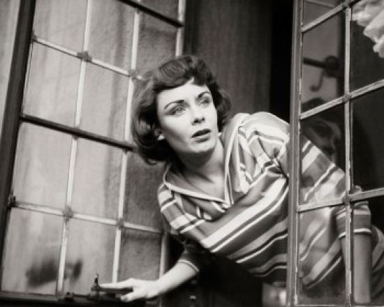 SAL2557043 Close-Up of a Young Woman Peeking Through a Window Poster Print - 18 x 24 in.