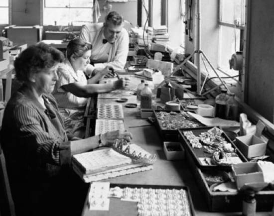 Three Workers in a Factory Poster Print - 18 x 24 in.