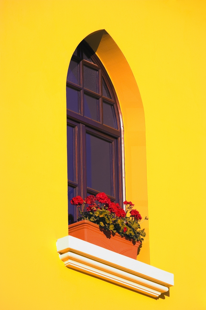 A Window in a Bright Yellow Wall Poster Print by Carson Ganci, 22 x 34 - Large
