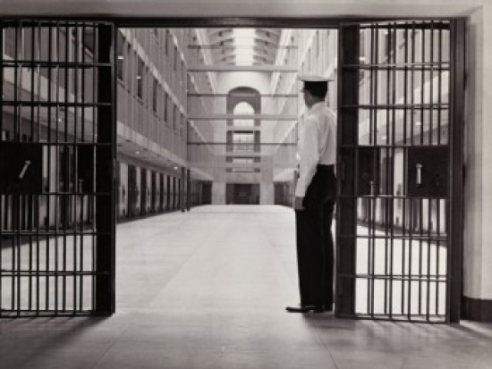 Side Profile of a Prison Guard Poster Print - 18 x 24 in.