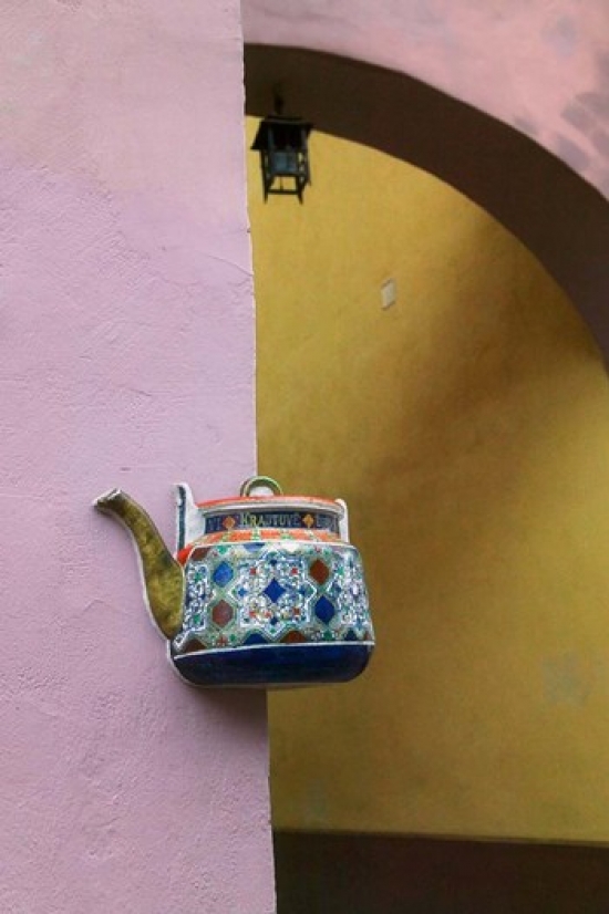 PDDEU46KSU0026 Wall Decorated with Teapot & Cobbled Street in the Old Town Vilnius Lithuania III Poster Print by Keren Su