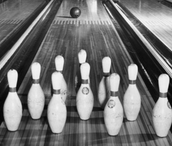 Bowling Ball Rolling Towards Bowling Pins Poster Print - 18 x 24 in.