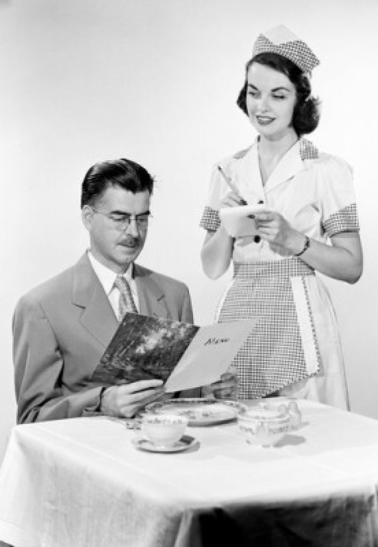 Waitress Serving Man at Restaurant Table Poster Print - 18 x 24 in.