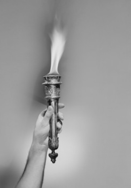 Womans Hand Holding Olympic Torch Poster Print - 18 x 24 in.
