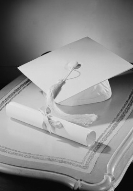 Graduation Diploma & Mortar Board on Bedside Table Poster Print - 18 x 24 in.