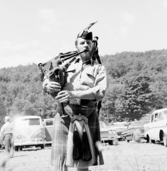 Man Playing Bagpipes Poster Print - 18 x 24 in.