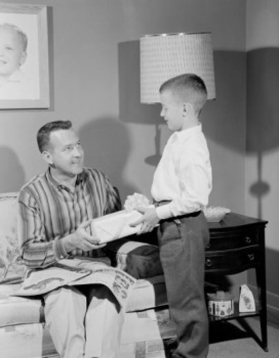 Boy Giving Gift to Father Poster Print - 18 x 24 in.