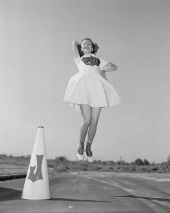 Cheerleader with Megaphone Jumping Poster Print - 18 x 24 in.