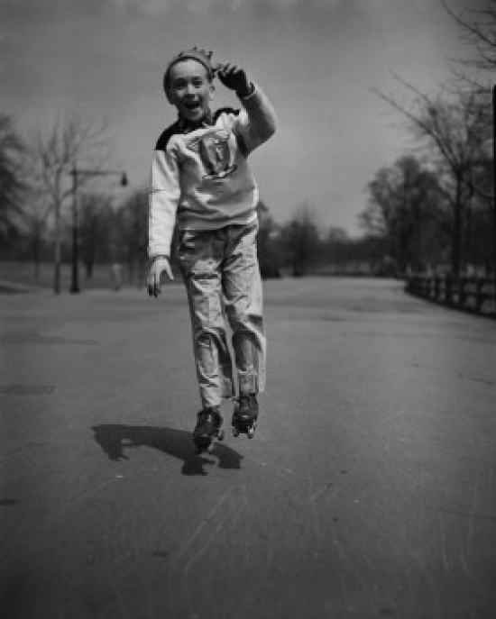 Boy Roller Skating in Park Poster Print - 18 x 24 in.