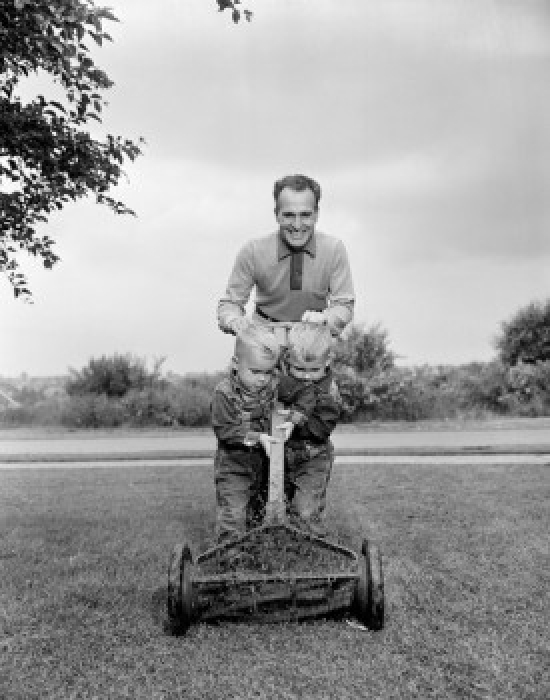 Father with Two Sons Mowing Lawn Poster Print - 18 x 24 in.