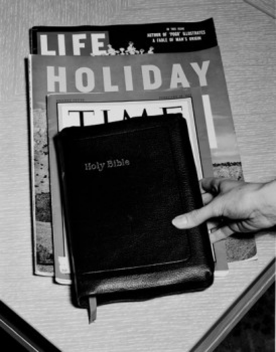 Hand Bible & Magazines Poster Print - 18 x 24 in.