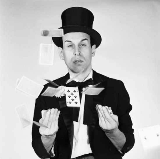 Magician Performing Card Tricks Poster Print - 18 x 24 in.