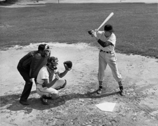 Baseball Player Swinging Baseball Bat with Baseball Catcher & Baseball Umpire Squatting Beside Him 18 x Poster Print - 18 x 24 in.