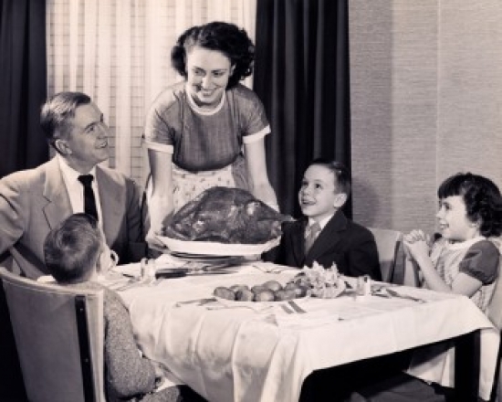 Mother Serving a Turkey on a Platter Poster Print - 18 x 24 in.