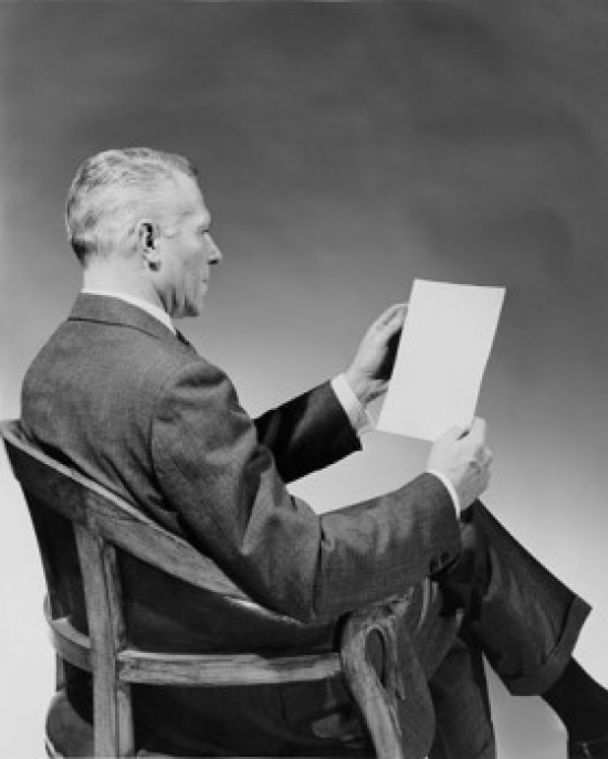 Side Profile of Businessman Holding Document Poster Print - 18 x 24 in.