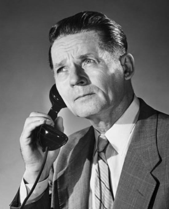Mature Businessman Using Telephone Poster Print - 18 x 24 in.
