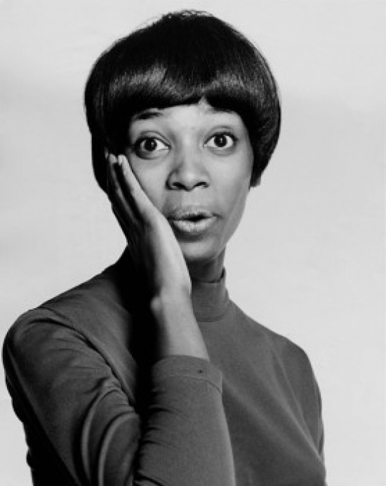 Portrait of a Young Woman Looking Surprised Poster Print - 18 x 24 in.