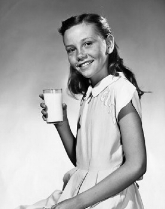 SAL2555743B Girl Holding a Glass of Milk & Smiling Poster Print - 18 x 24 in.