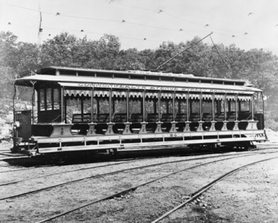 Cable Car Moving on a Railroad Track Poster Print - 18 x 24 in.