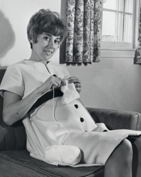 SAL2557522 Portrait of a Pregnant Woman Knitting Baby Booties Poster Print - 18 x 24 in.