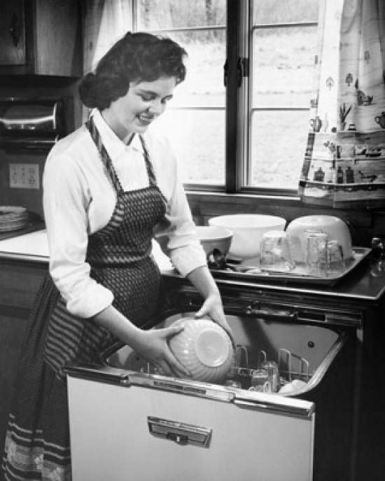 Young Woman Working in a Kitchen Poster Print 18 x 24 in.
