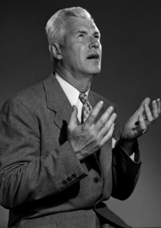 Studio Portrait of Man Gesturing Poster Print - 18 x 24 in.