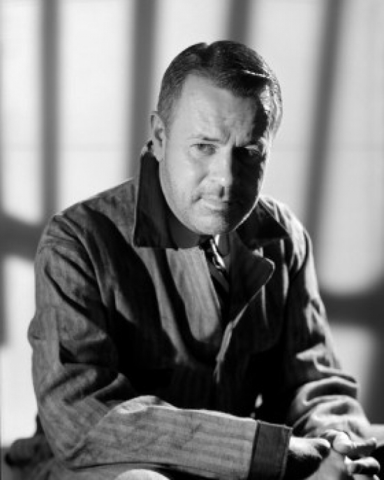 Man Sitting with Hands Clasped Poster Print - 18 x 24 in.