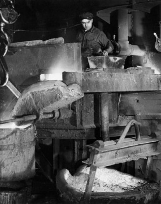 Foundry Worker Pouring Molten Steel in a Container Poster Print - 18 x 24 in.