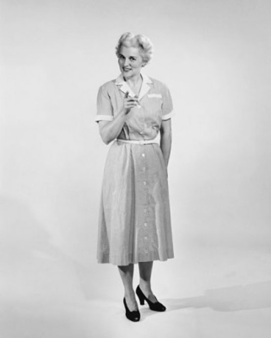 Mature Woman Standing & Pointing Forward Poster Print - 18 x 24 in.