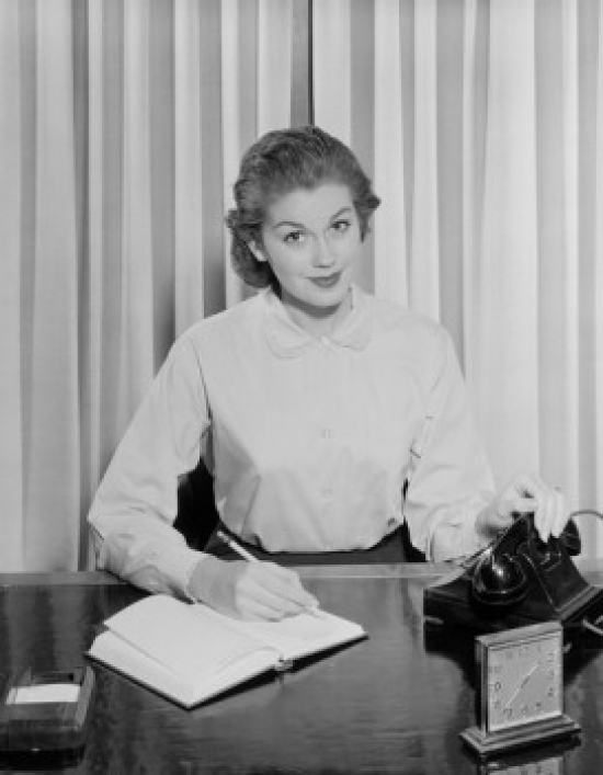 Secretary Working in Office Environment Poster Print - 18 x 24 in.