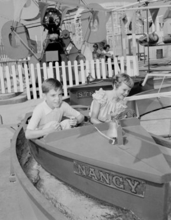 Kids in Amusement Park Poster Print - 18 x 24 in.