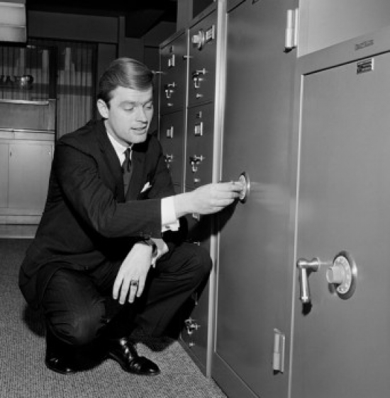 Businessman Opening Safe Poster Print - 18 x 24 in.
