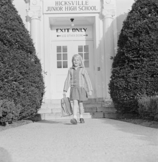 Schoolgirl Leaving School Poster Print - 18 x 24 in.