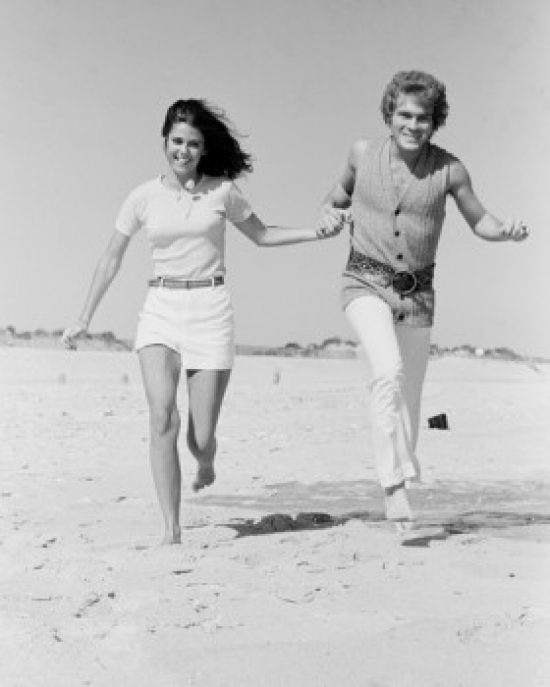 Young Couple Running on Beach Poster Print - 18 x 24 in.