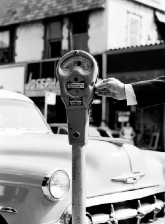 Man Putting Money Into Parking Meter Poster Print - 18 x 24 in.