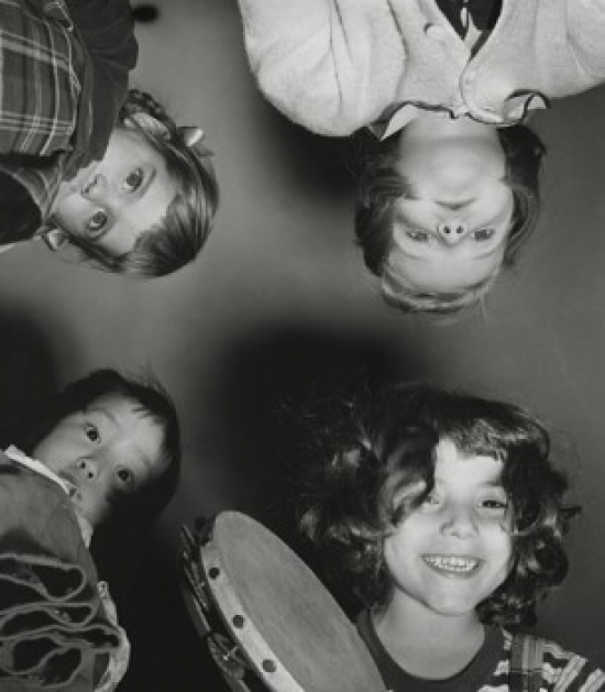 SAL9904368 Low Angle View of Children Holding a Tambourine Poster Print - 18 x 24 in.