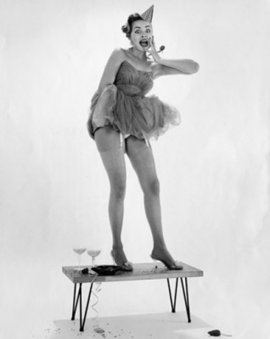 Young Woman Dancing on a Table Poster Print - 18 x 24 in.