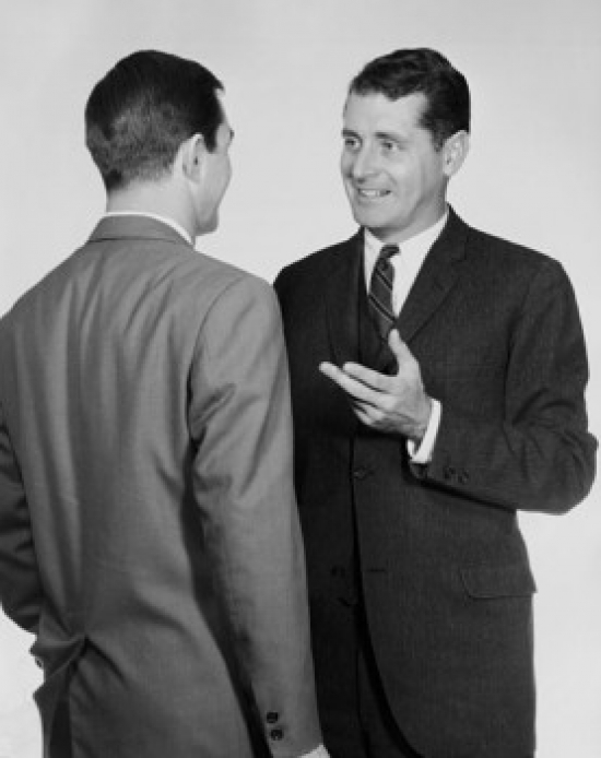 Two Businessmen Talking Poster Print - 18 x 24 in.