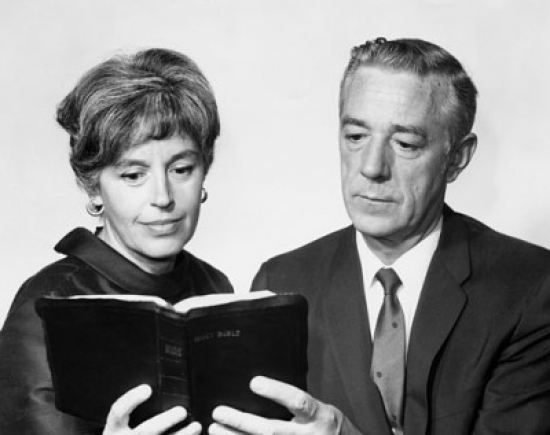 Senior Couple Reading a Book Poster Print - 18 x 24 in.