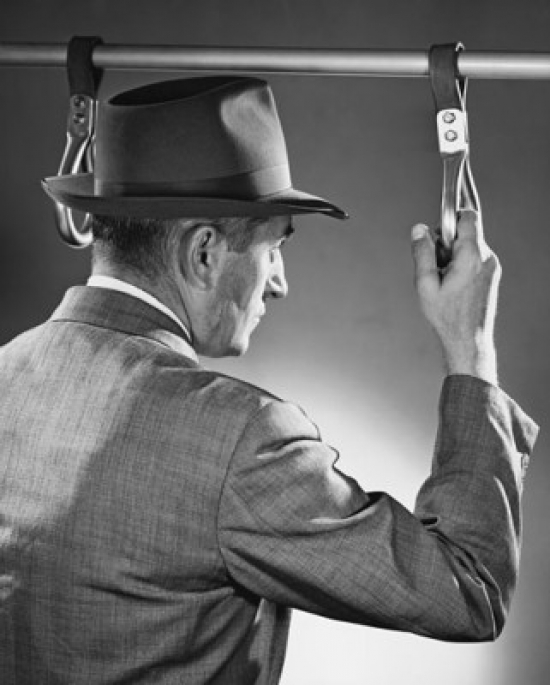 Businessman Holding a Handle Strap in a Bus Poster Print - 18 x 24 in.