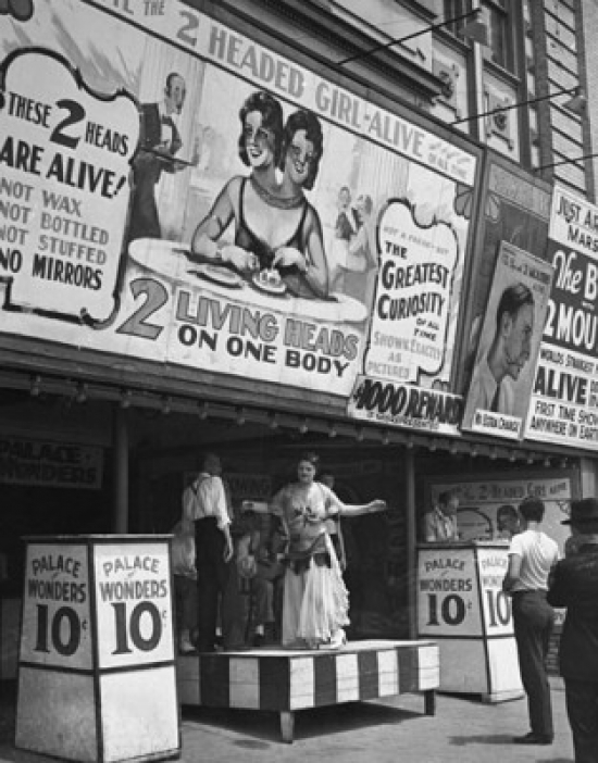 Low Angle View of a Sideshow Billboard Poster Print - 18 x 24 in.