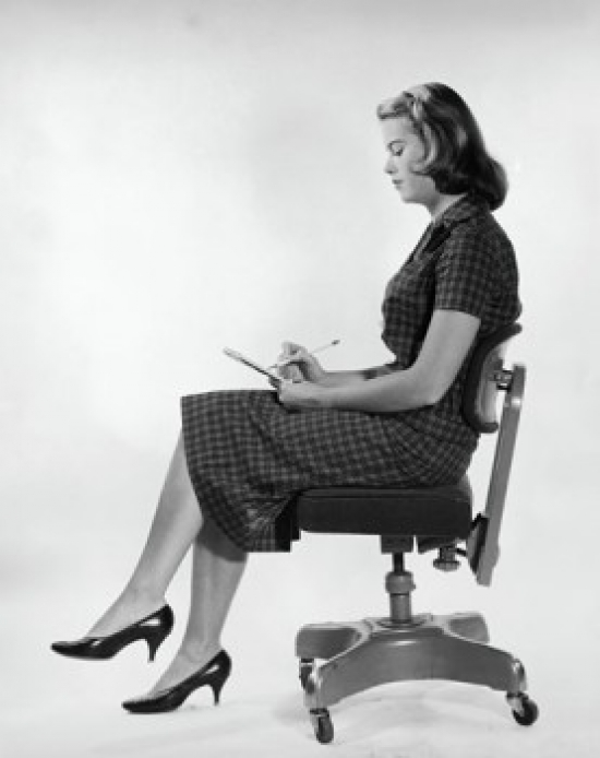 Side Profile of a Young Woman Writing on a Notepad Poster Print - 18 x 24 in.