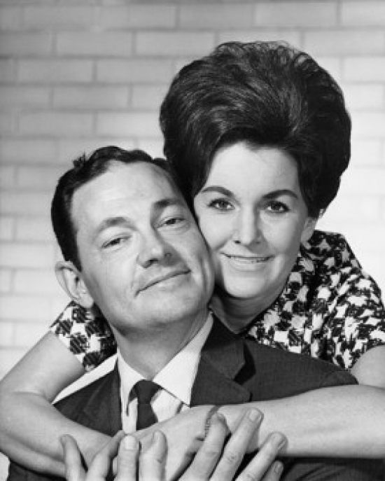 SAL2557322 Portrait of a Mid Adult Woman Embracing a Mid Adult Man From Behind Poster Print - 18 x 24 in.