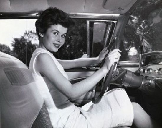SAL2557877 Young Woman Sitting in the Drivers Seat of a Car & Smiling Poster Print - 18 x 24 in.