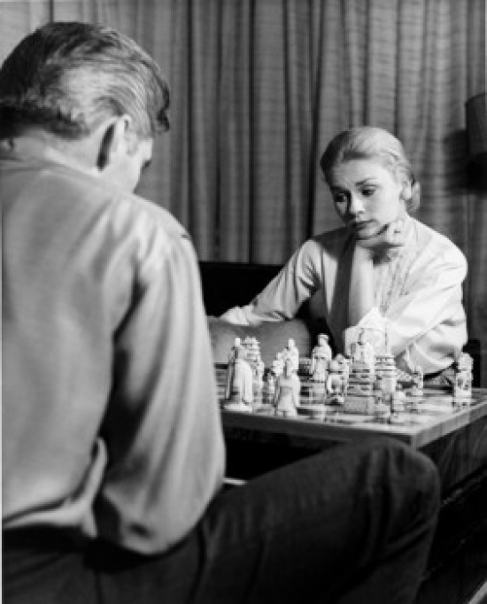 Couple Playing Chess at Home Poster Print - 18 x 24 in.