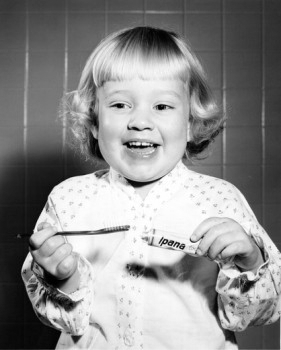 Girl Brushing Teeth Poster Print - 18 x 24 in.