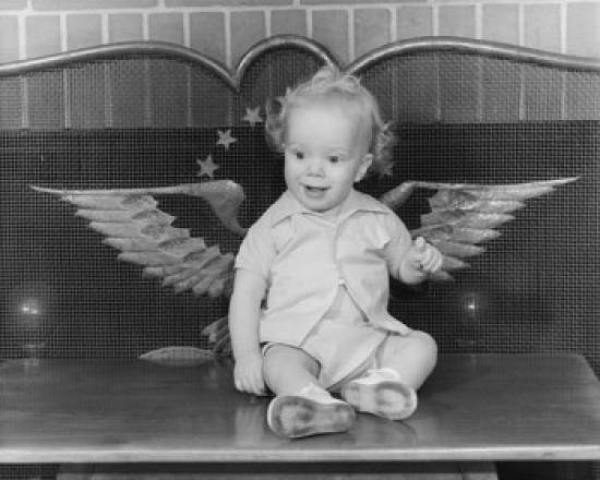 Baby Sitting by a Fireplace Poster Print - 18 x 24 in.