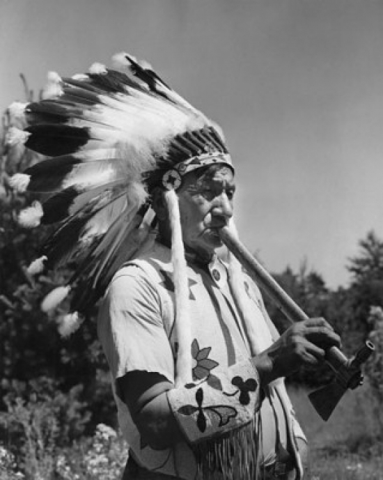Tribal Man Playing a Flute Poster Print - 18 x 24 in.