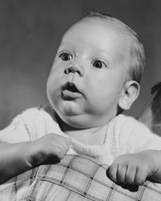 Baby Holding Blanket Poster Print - 18 x 24 in.